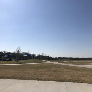 Paved walking to the right - play area to the left