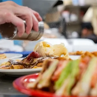 a plate of waffles, waffles, and ice cream