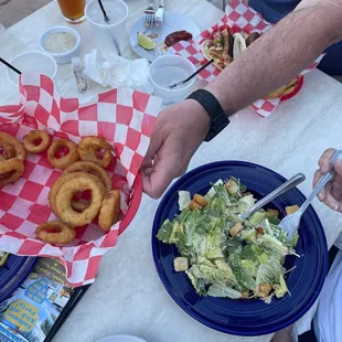 a table full of food and drinks