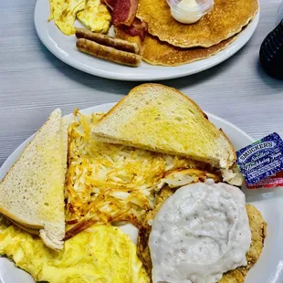 two plates of breakfast food