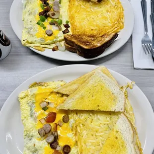 two plates of breakfast food
