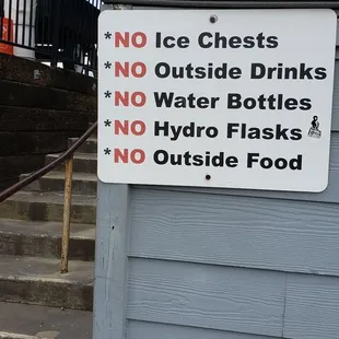 Sign and steps headed up to venue.