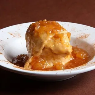 a bowl of food with a scoop of ice cream