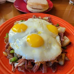 Corned Beef Hash. Eggs Sunnyside Up.