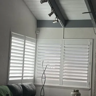 Front living room Plantation Shutters , really came out great and really changed the appearance of my house inside and out .