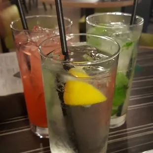 a row of glasses filled with drinks