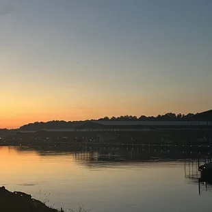 a sunset over a body of water