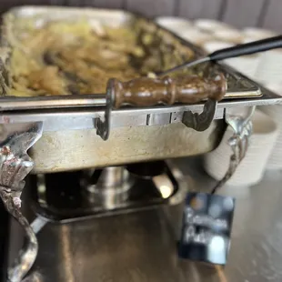 a pan of food being cooked