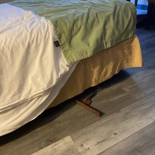 The bed rail had fallen off and was just laying on the floor.  I am glad I saw it before my toes did.