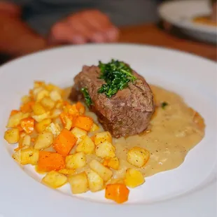 Dinner Special - Short Rib, Fried Parsley, Turnips, Parsnip, sweet potato,on top of mashed potatoes and gravy