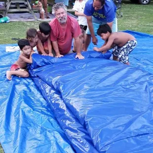 My grandbabies thought it was so fun helping to get the air out of the bouncer and then helping to roll it up like a sushi.