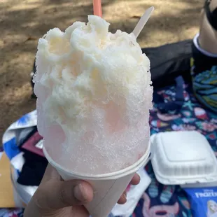 Lychee and coconut shaved ice topped with condensed milk (I think).
