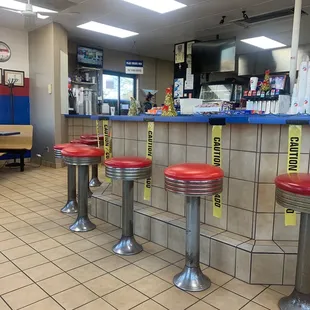 a row of red stools
