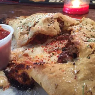 Proper Calzone and a beautiful redhead barkeep. Does it get any better?