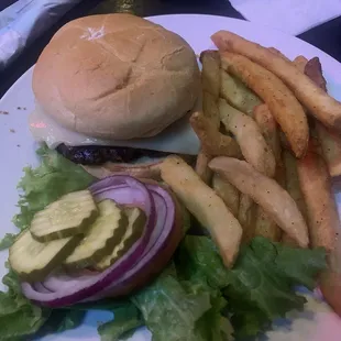 Burger with fries with pickles, lettuce and tomato&apos;s