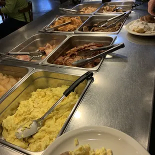 Main buffet eggs, meat, taters, grits, pancakes