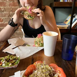 Savory quinoa bowl, bagel with salmon, and side of the day featuring edamame