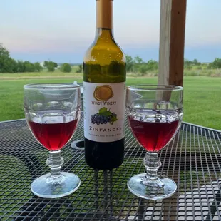 Glasses of wine sitting on the pavilion at Windy Winery