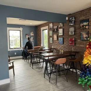 a colorful christmas tree in a restaurant