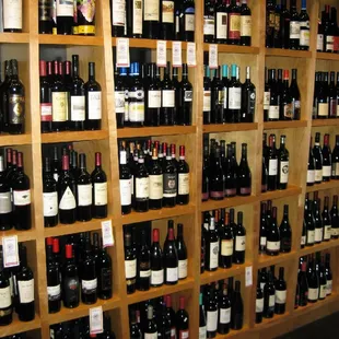 a wall full of wine bottles