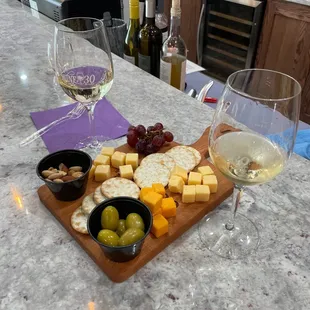 The small board and a couple of nice white wines - all good and lots to pick from!  Great new spot that you need to check out!