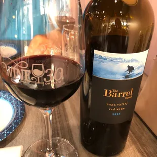 A bottle of The Barrel Blend Napa Valley wine.