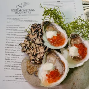 Red salmon caviar oysters on half shell