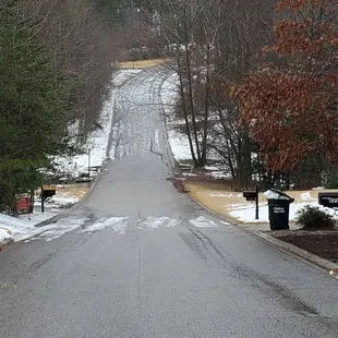 We spent the day watching cars make multiple attempts to climb this icy hill.