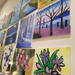 Paintings displayed on the walls