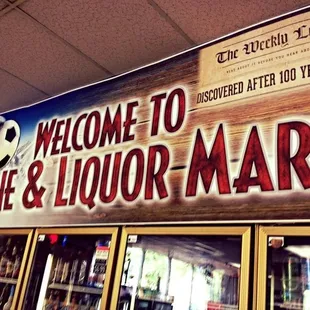 a sign for a liquor store