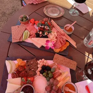 a woman sitting at a picnic table