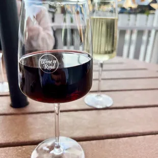 a glass of wine on a table