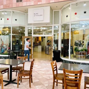 the entrance to a wine shop