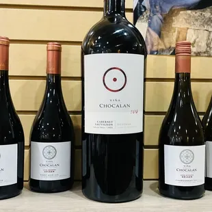 five bottles of wine on a counter