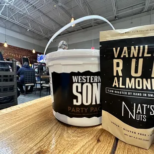 a bucket of vanilla rum and a bag of almond