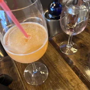 I just came here to chat and ended up with a wine slushee and purchasing a tasting .