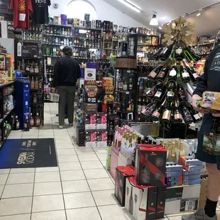 a man shopping in a liquor store