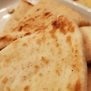 Shrimp Danielle app is served with pita triangles