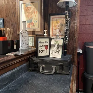a bar counter with a lot of items on it