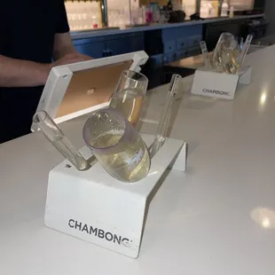 a row of wine glasses on a counter