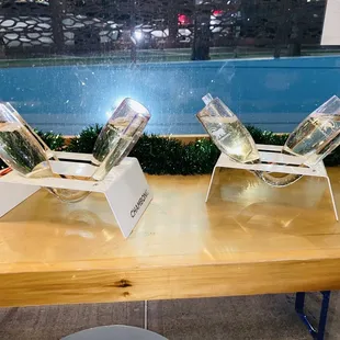 three wine glasses on a table