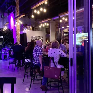 a group of people sitting at a table