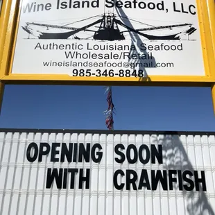 sign for opening soon with crawfish