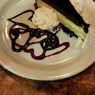 Cheesecake topped with chocolate ganache