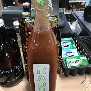 a bottle of red wine on a table