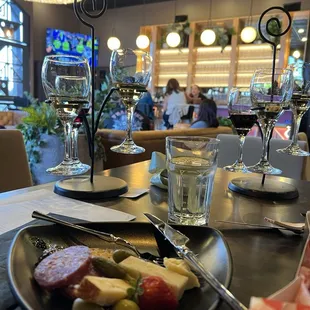 White wine flight and small charcuterie board.