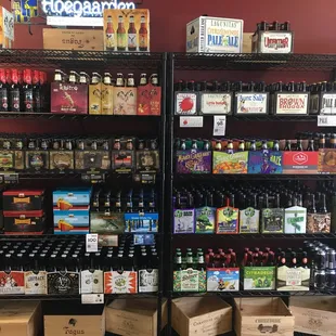 a variety of beers on shelves