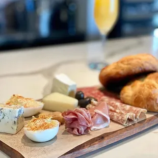 2nd street Brunch Board, 3 types of cheeses and 3 types of meats served with warm croissants