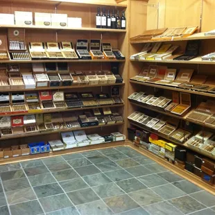 cigars, cigars, and cigars on shelves