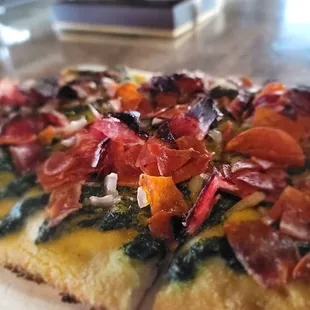 a close up of a pizza